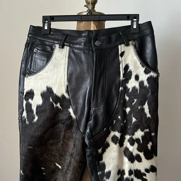 These trousers bring together cowhide fur and leather for a standout design. Rich textures and striking details make them an eye-catching choice for those who appreciate bold fashion.