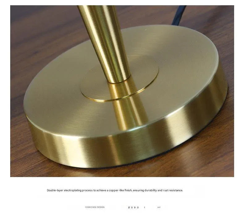 Modern Scandinavian brass table lamp with linen shade