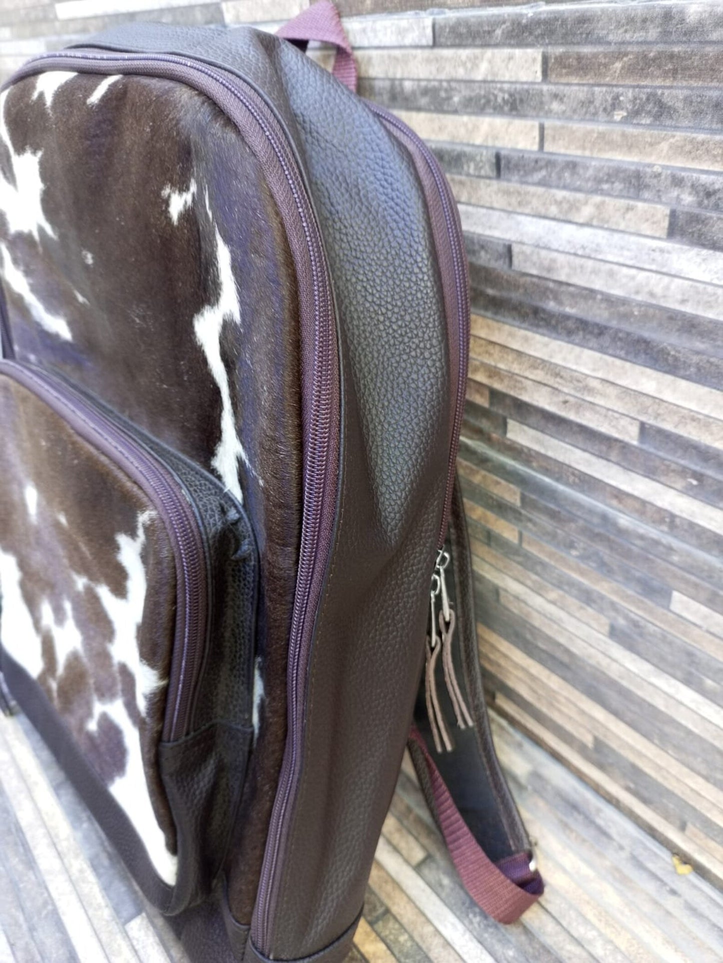 Real hair on cowhide backpack