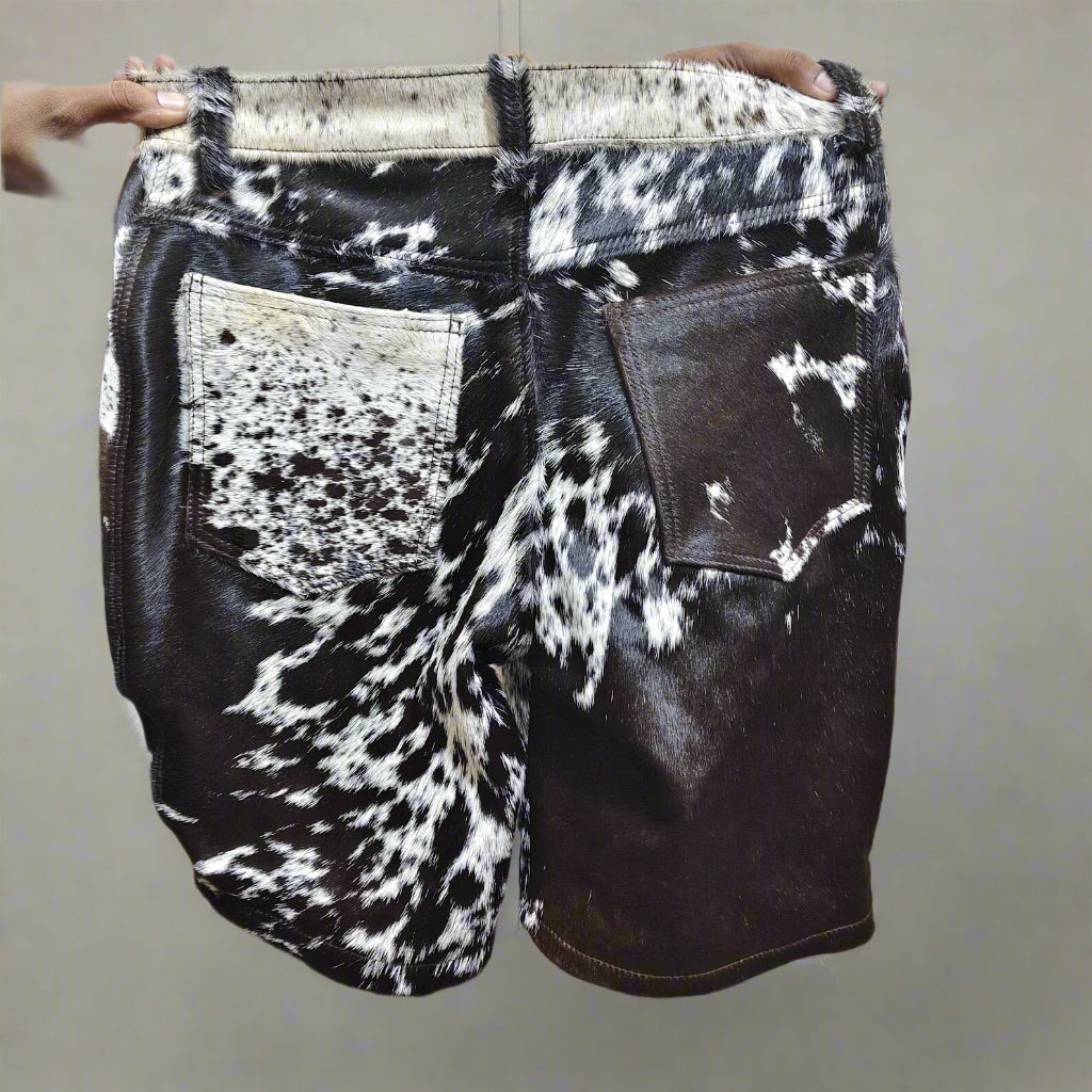 Shop black and white cowhide shorts for men with real cow fur. Great for rodeo events, southern wear, and western cowboy looks.