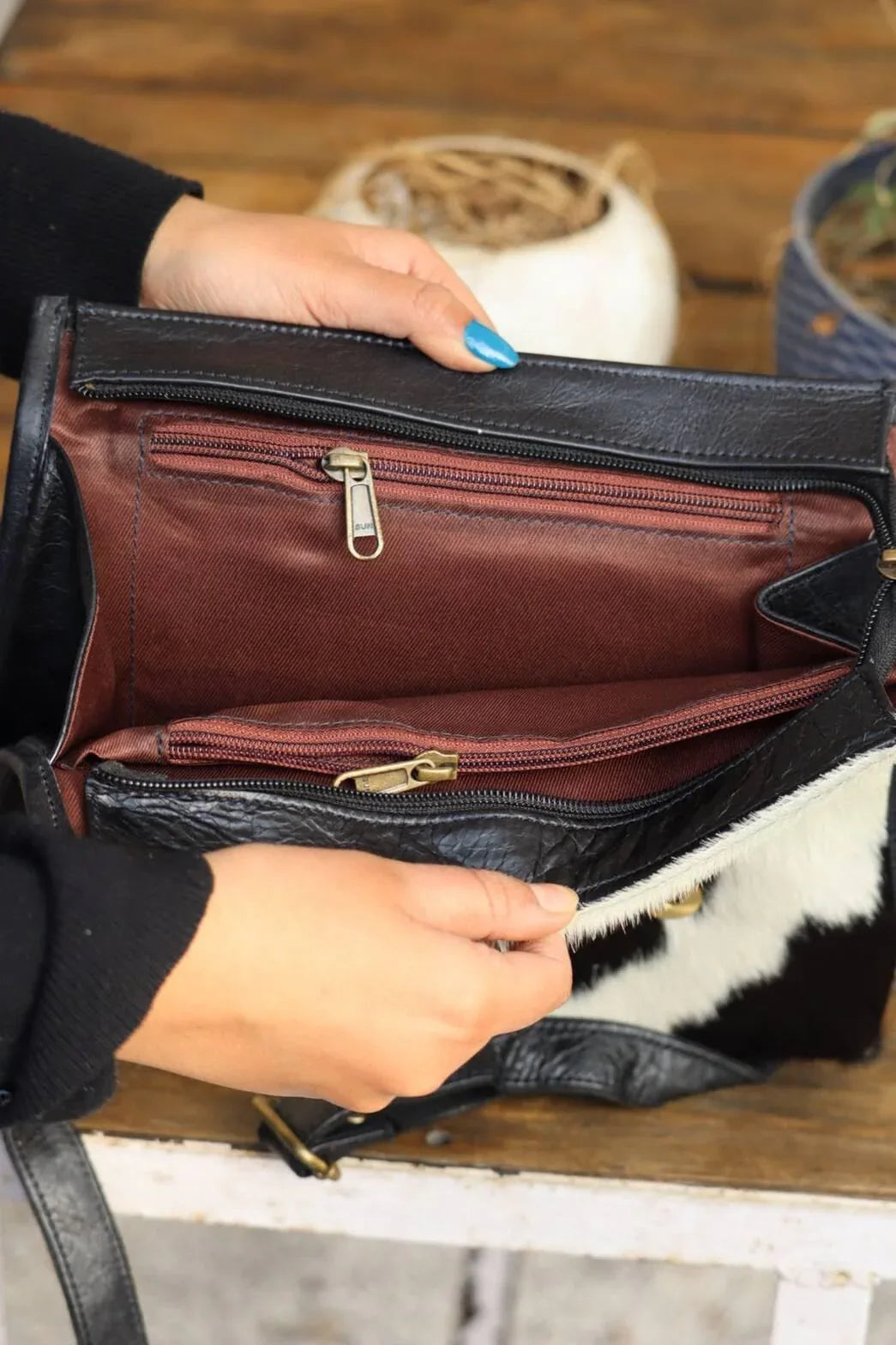 cowhide backpack purse black white