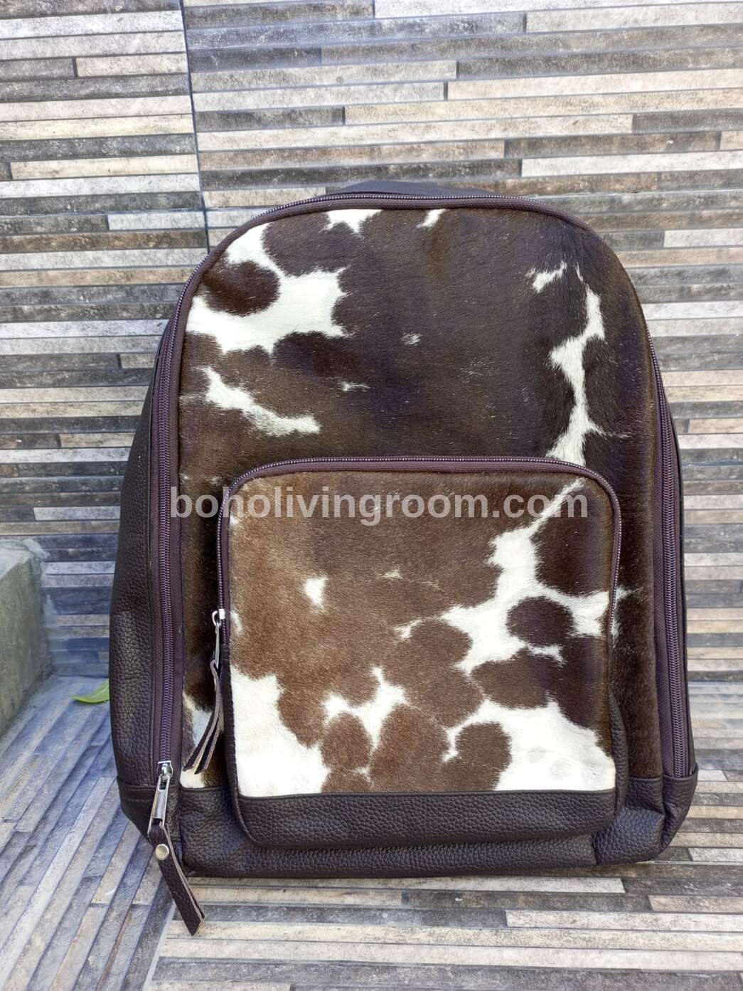 Real hair on cowhide backpack