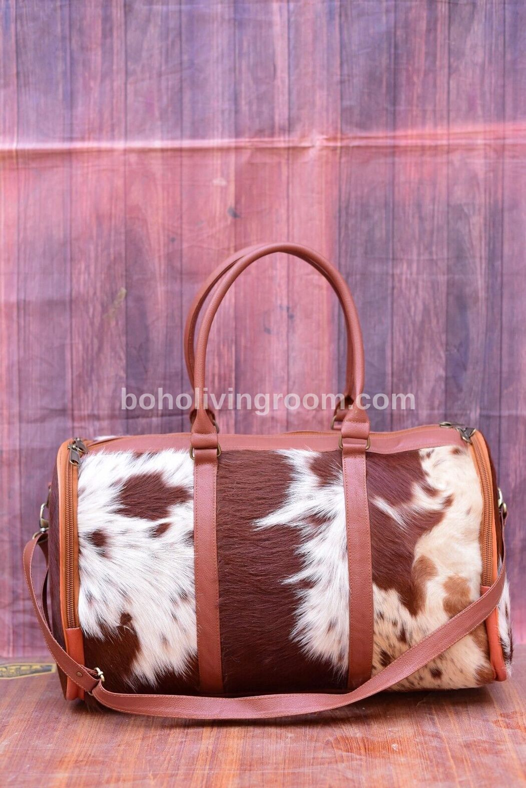 Cowhide travel bag handcrafted leather, built to roam. Weekends, gym, rodeo ready, southern style, timeless gift.