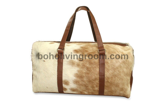Classic cowhide duffle for your travel needs.