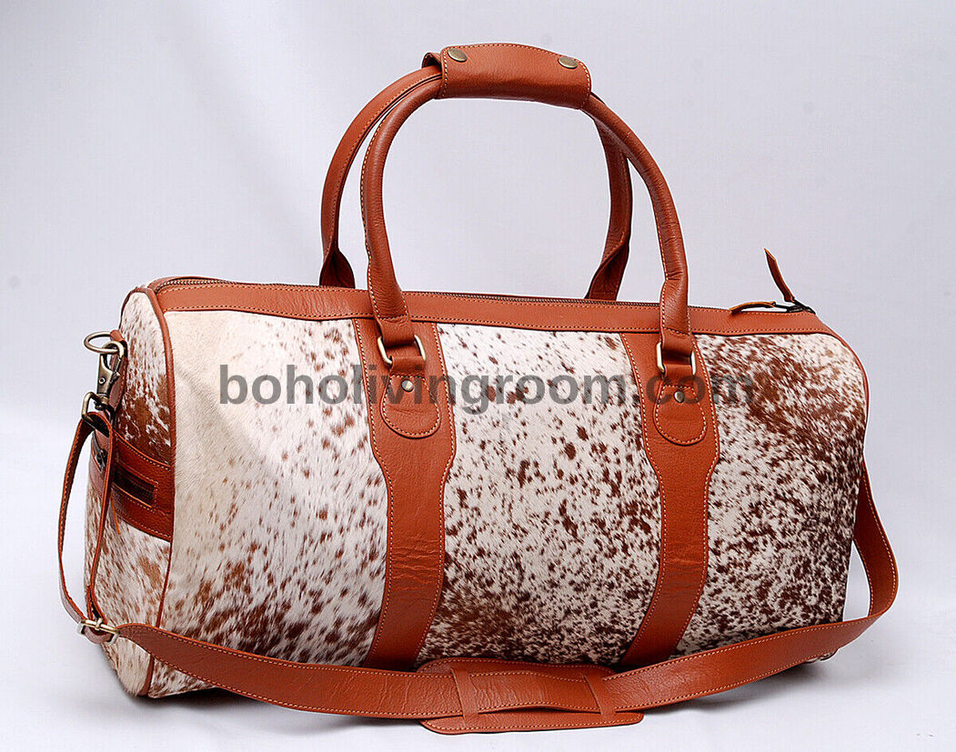 Discover the epitome of luxury travel with this exquisite cow skin travel bag, designed for discerning explorers.