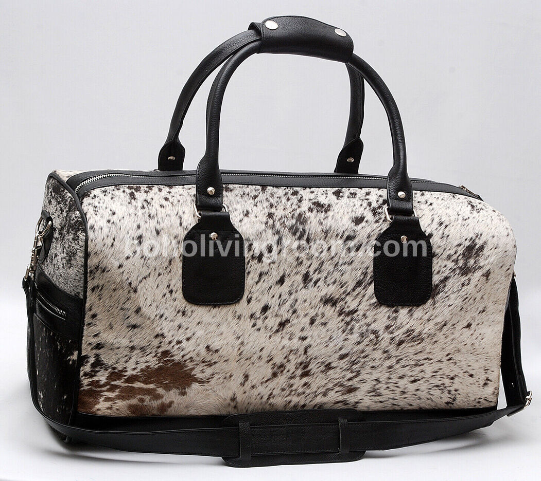 Navigate the world in style with this cowhide travel bag, a fusion of elegance and wanderlust crafted for the modern explorer.