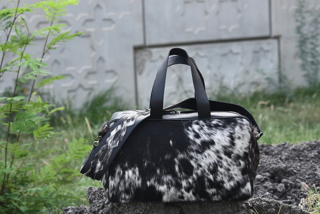 Hit the road with confidence with our premium cowhide duffle bag. Crafted for durability and designed for convenience, it's a traveler's dream.