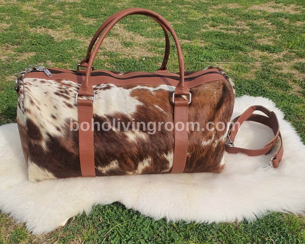 Achieve your fitness goals with this cow skin gym bag, your partner for workouts and beyond.