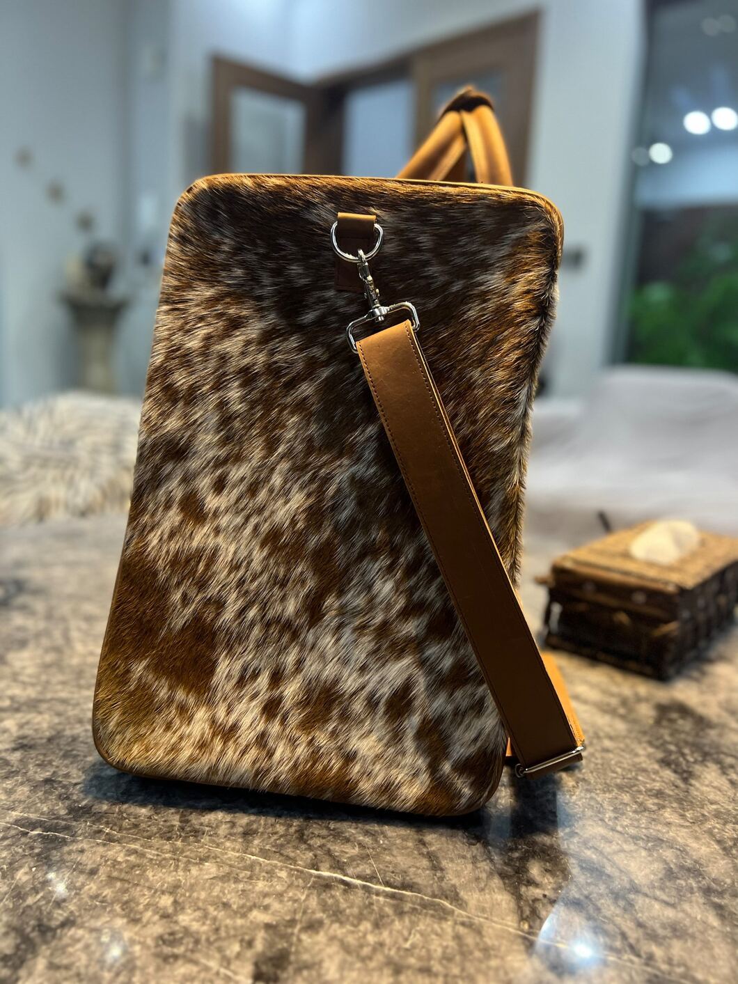Achieve your fitness goals with this cow skin gym bag, designed for active lifestyles.