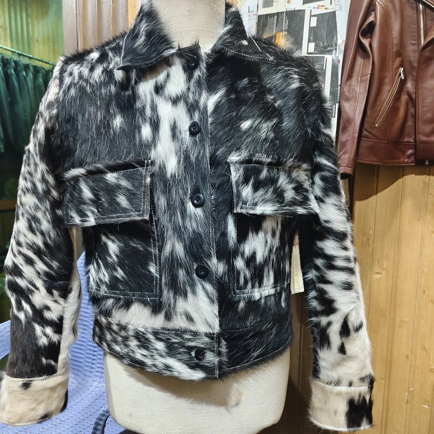Make a bold impression with a real cow print fur jacket crafted from natural cowhide. Each piece features distinctive black and white patterns.