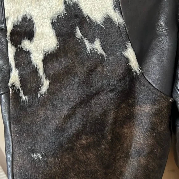 Cowhide fur and leather blend in these trousers, creating a unique texture that catches the eye. Designed for those who prefer something different in their collection.