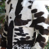 Cowhide jackets for men made from genuine pony skin with unique patterns. Button-front closure and full-length sleeves ideal for cooler weather.