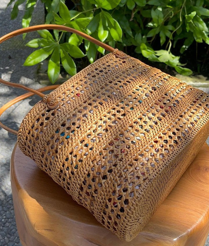 Stylish handwoven net rattan handbag