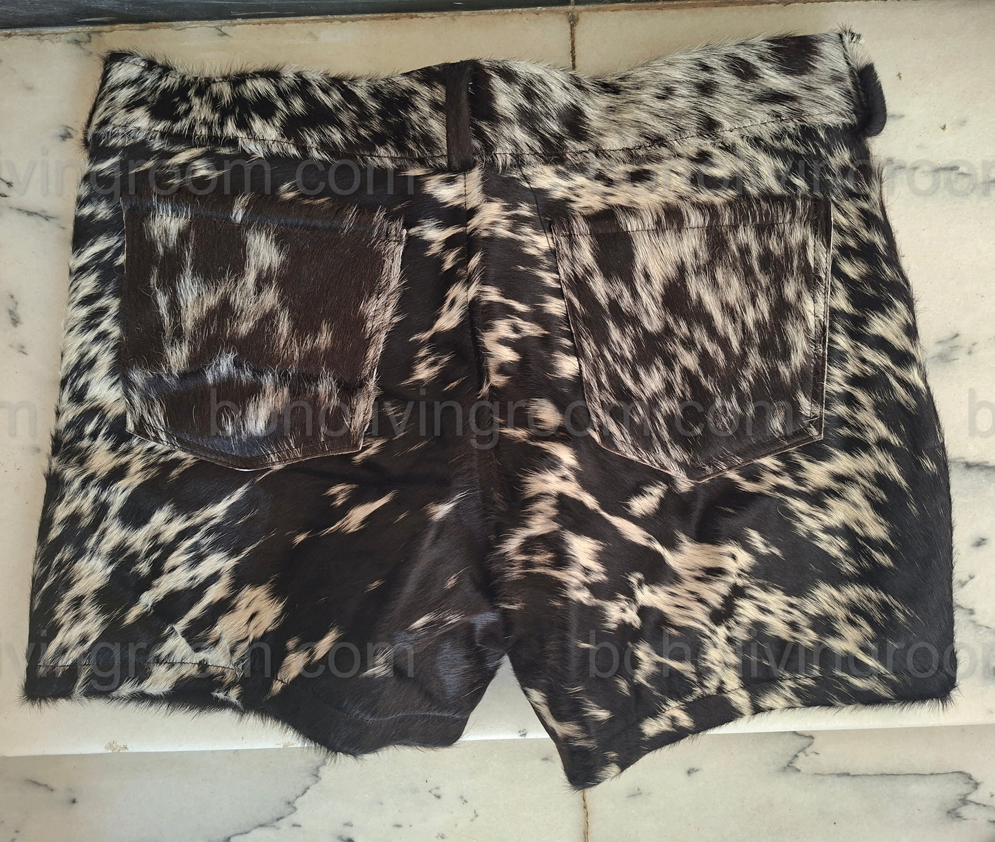 Women’s cow print shorts made from genuine hair-on hide. Great for rodeo events, ranch wear, and standout country fashion styles.