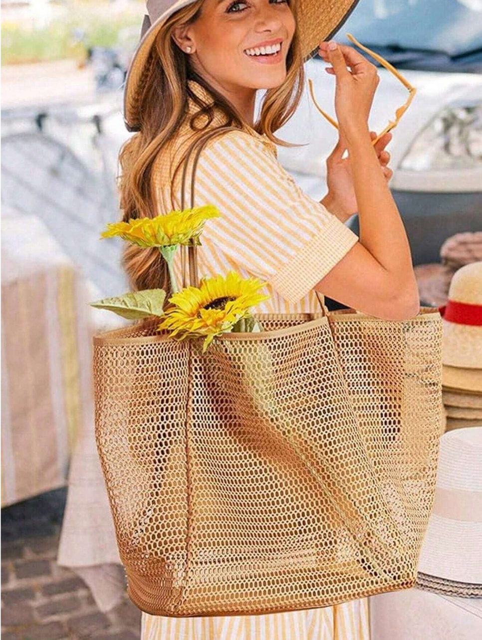 Flat lay of a woven bag, flip-flops, and swimwear ready for beach time