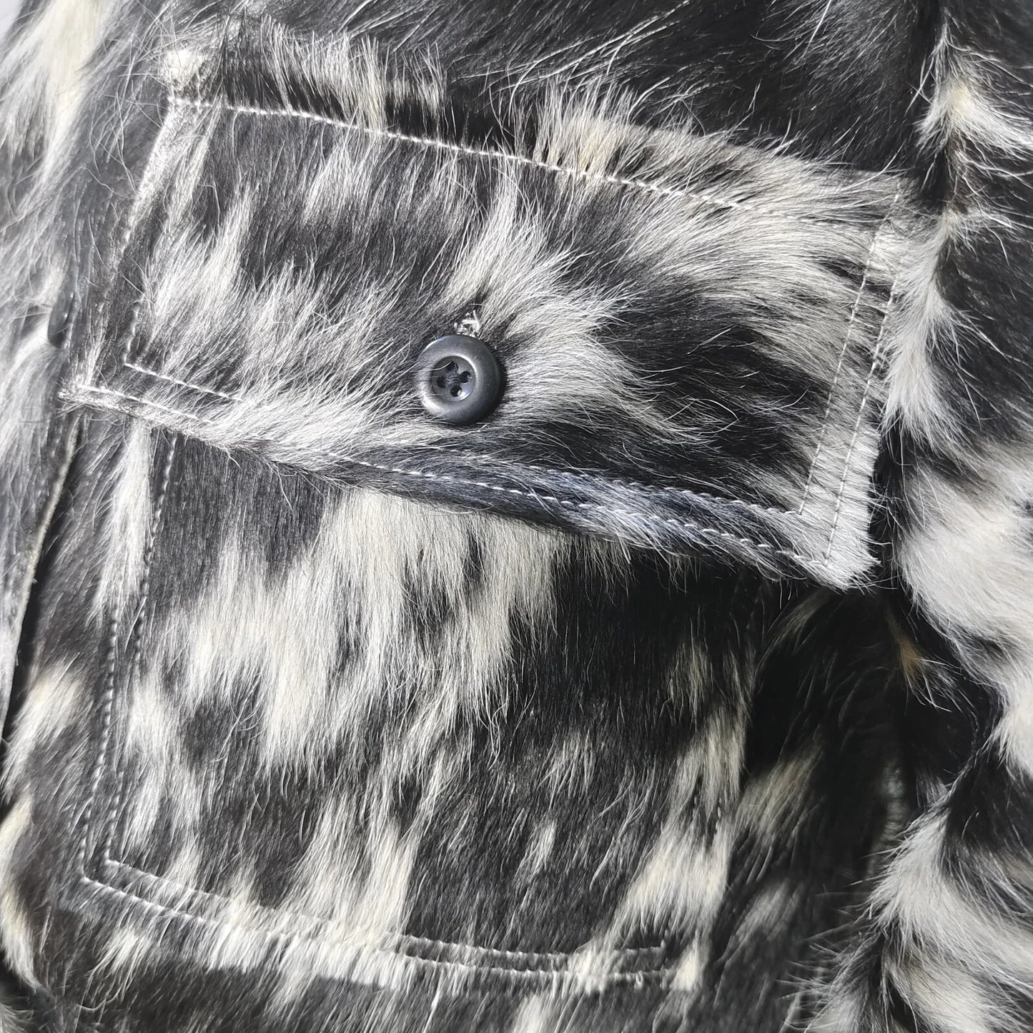 Stand out in a handcrafted cow print fur jacket with a sharp silhouette and authentic hair-on cowhide. Designed for bold, fashion-forward styling.