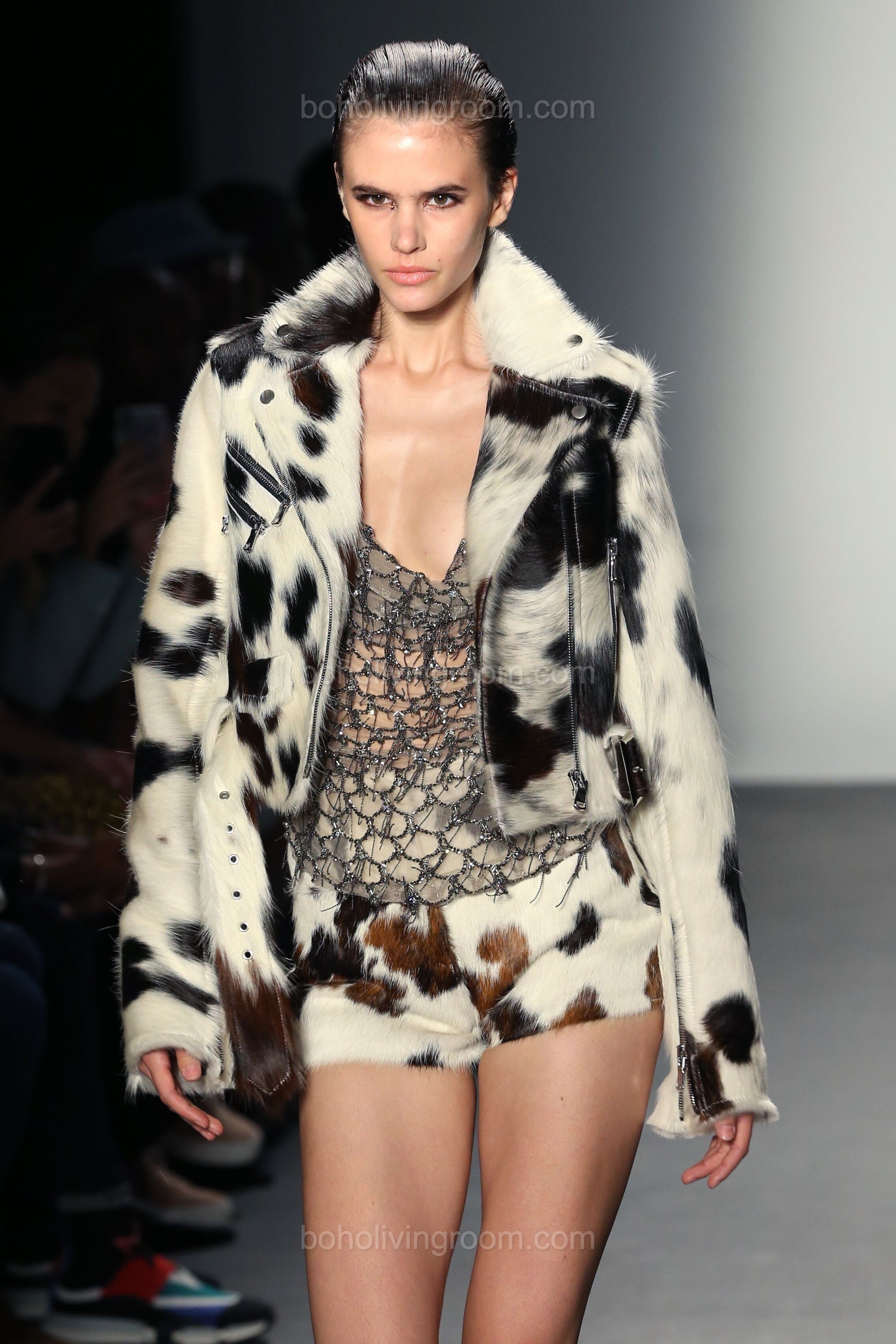 Women’s cowhide leather jacket with matching cow shorts—made from real hair-on-hide cow skin for standout street or festival fashion.