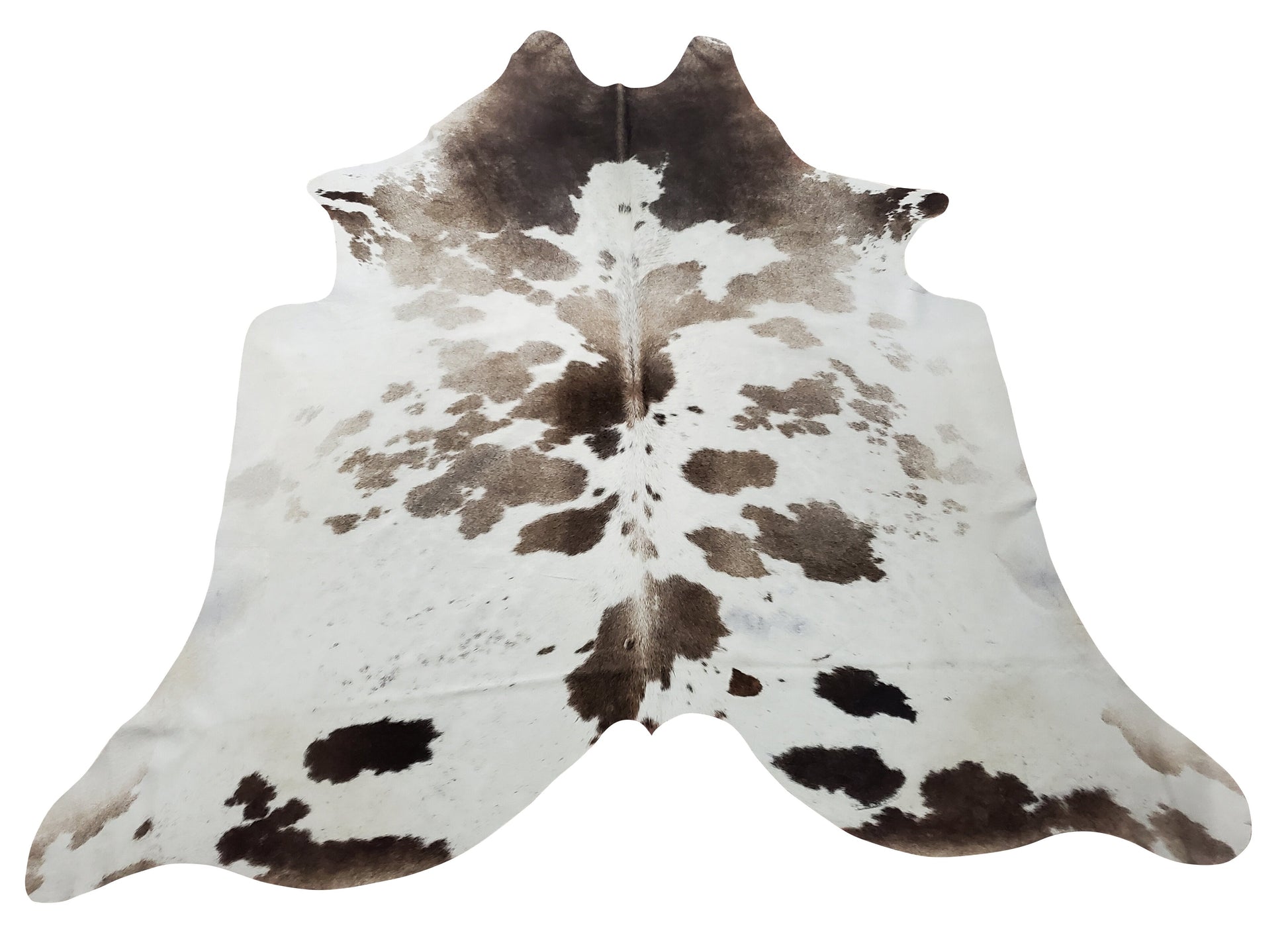 Spotted grey white cowhide rugs have proven themselves to be the main decorating element in any classic home from modern rustic or simple yet elegant