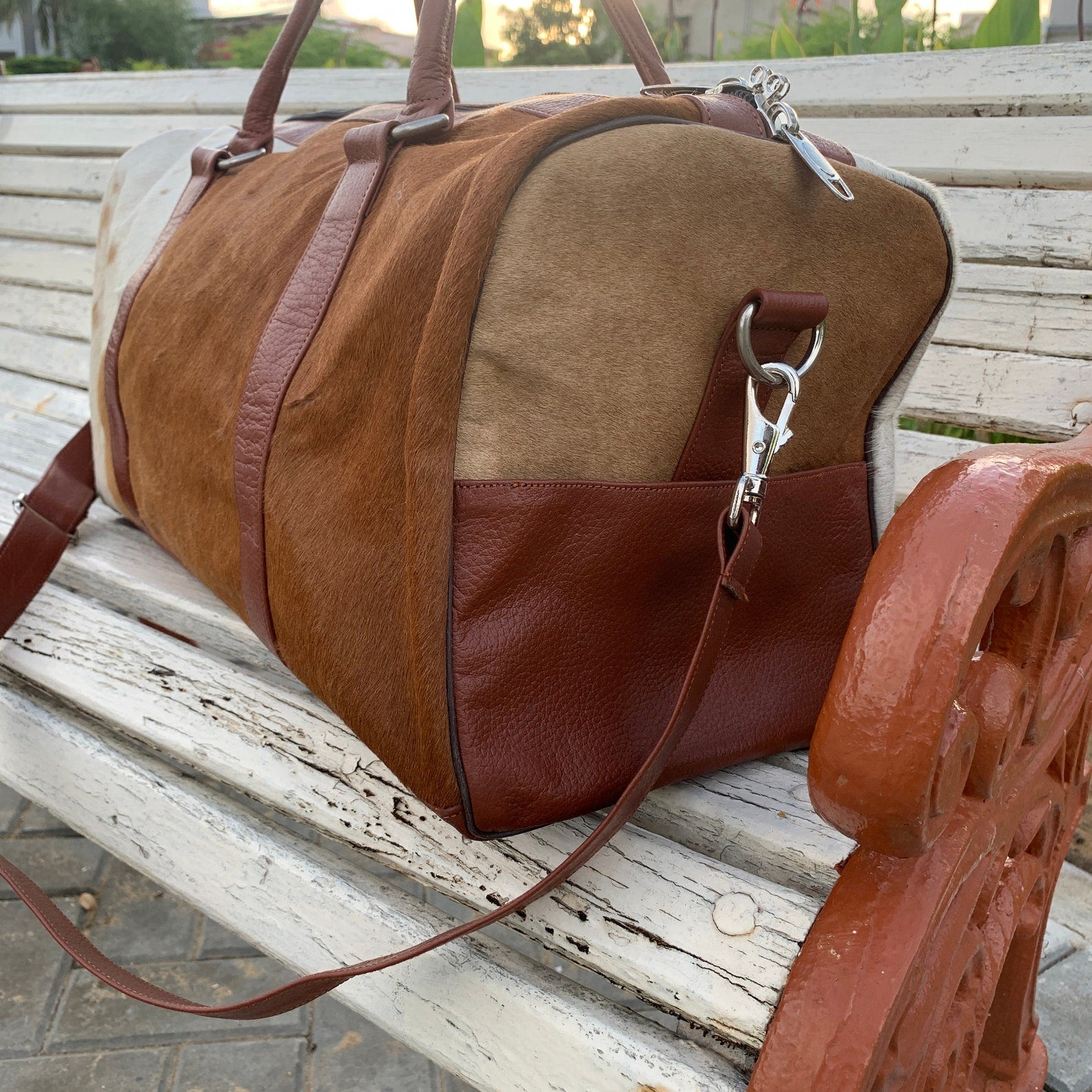 Hit the gym in style with this cow skin gym bag, your essential companion for fitness.