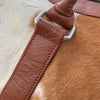 Indulge in elegance with a cow fur overnight bag, your essential companion for luxurious travel experiences.