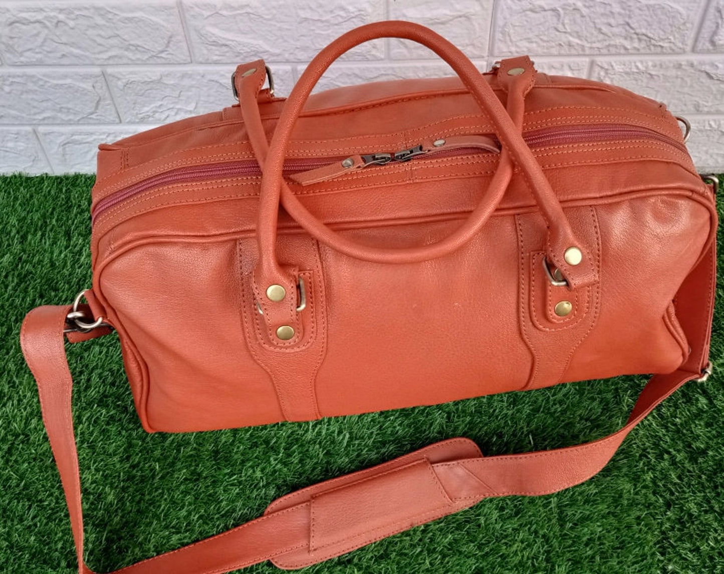 Pumpkin Orange Leather Weekender Bag