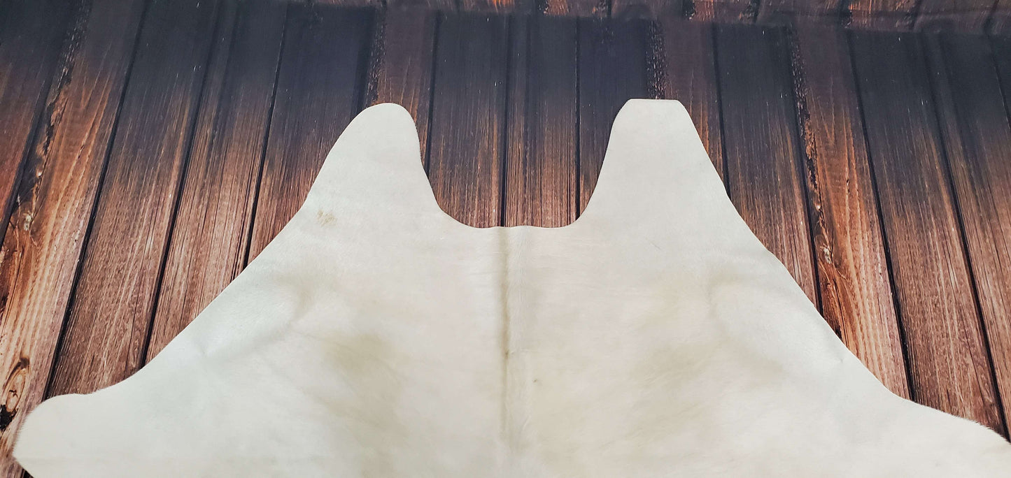 Beige And White Cowhide Rug