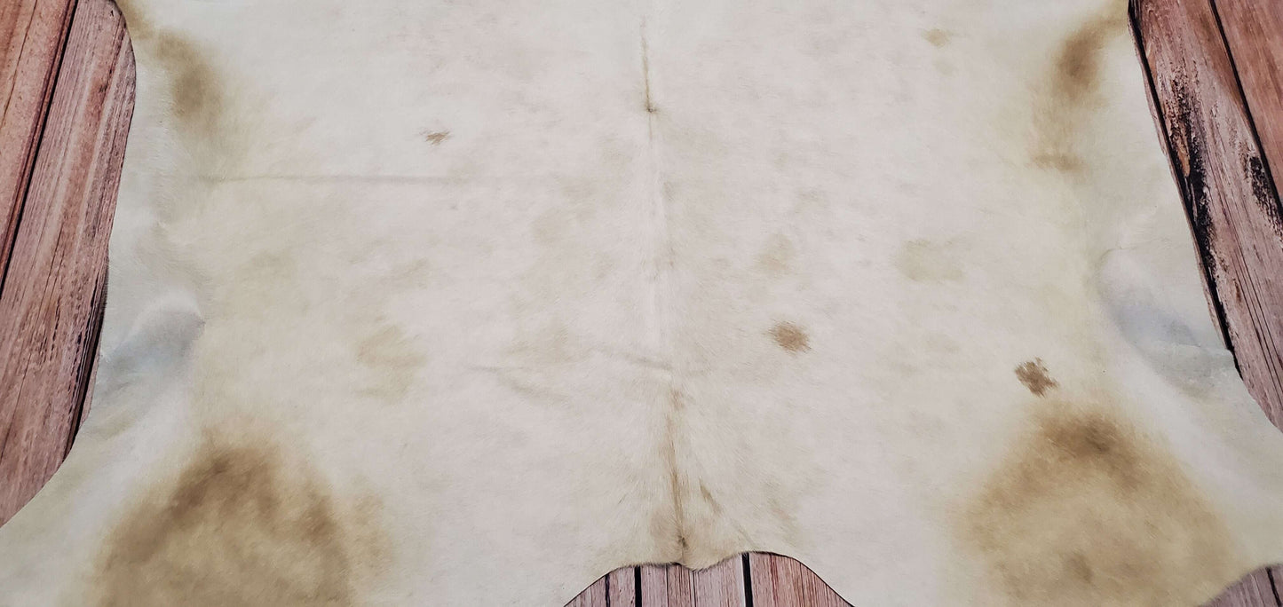 Beige And White Cowhide Rug