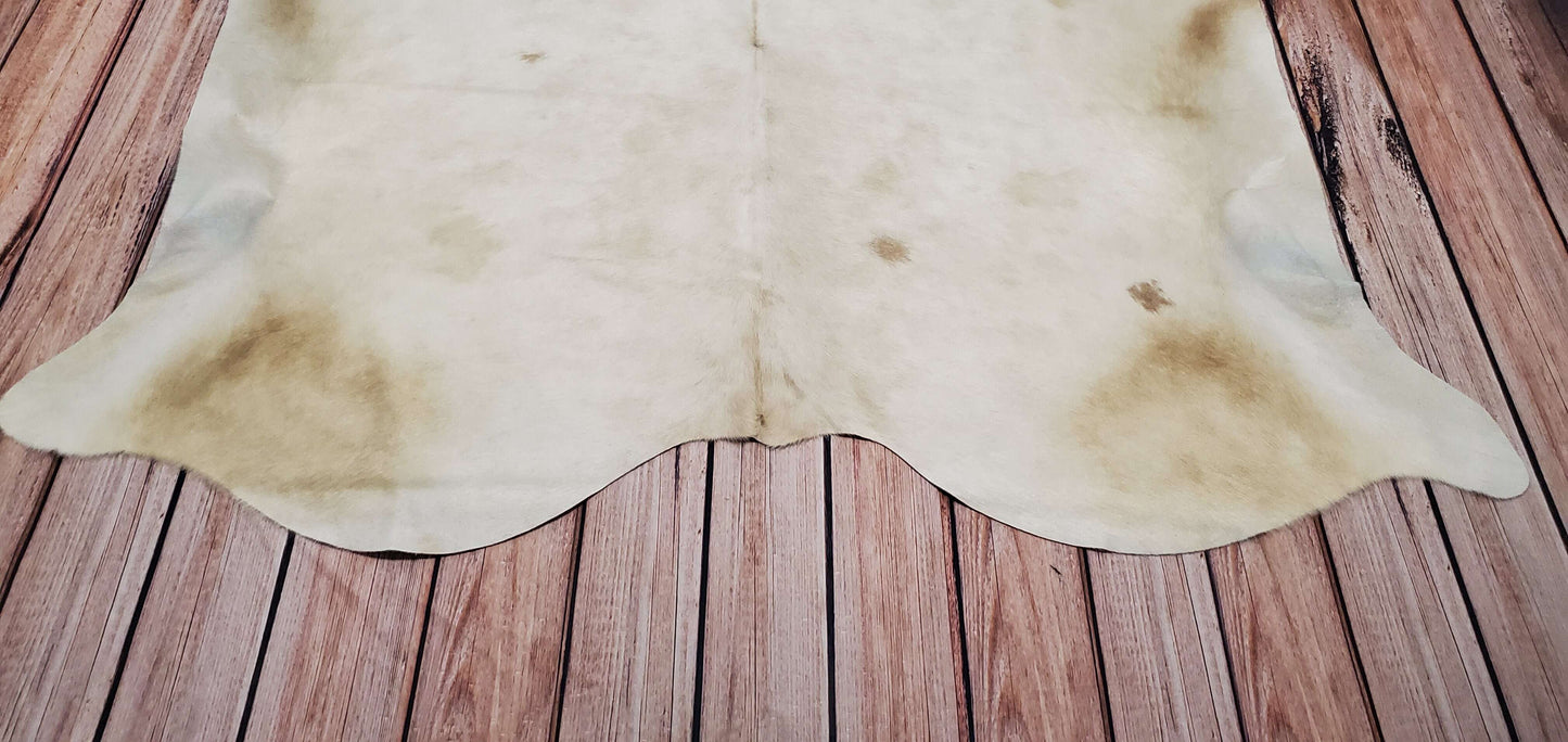 Beige And White Cowhide Rug