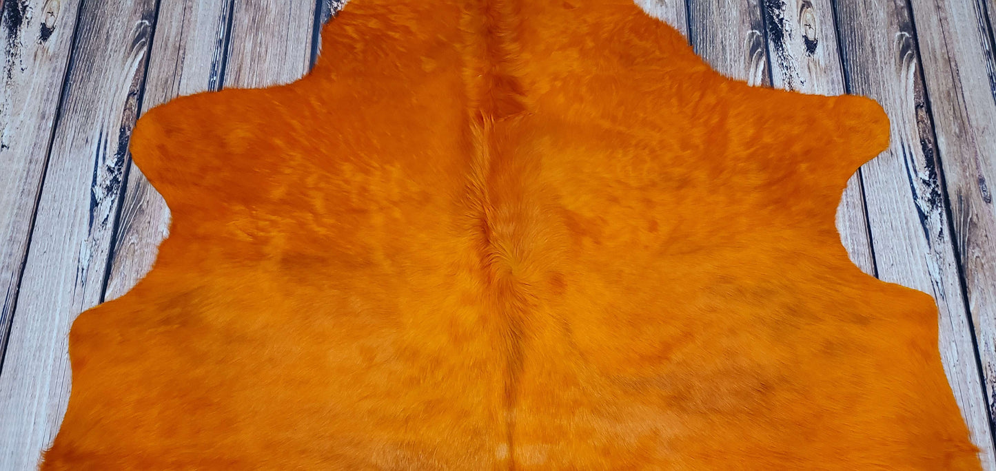 Dyed Orange Cowhide Rug 6ft x 5.5ft