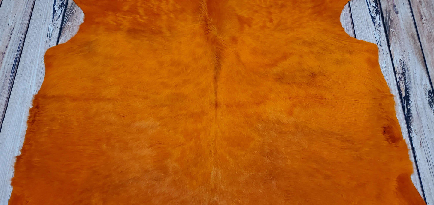 Dyed Orange Cowhide Rug 6ft x 5.5ft