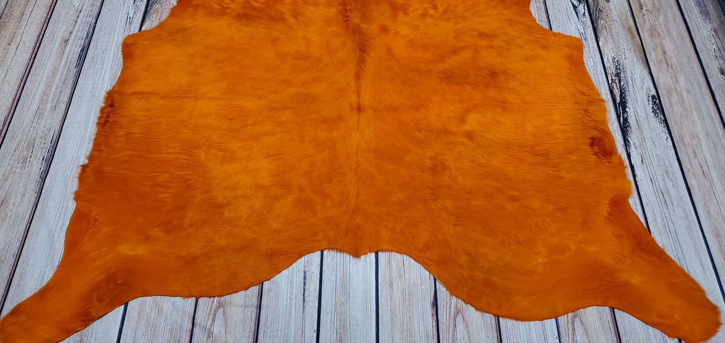 Dyed Orange Cowhide Rug 6ft x 5.5ft