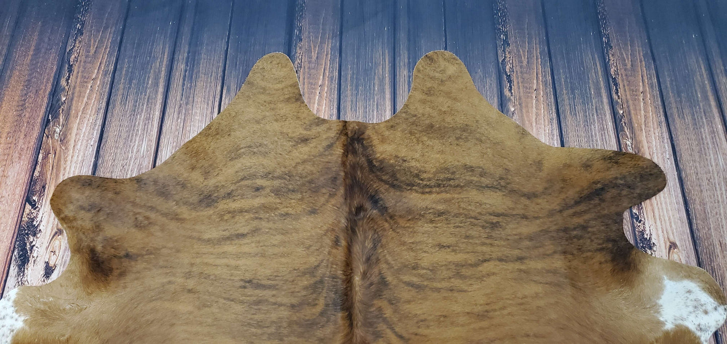 brown cowhide rug