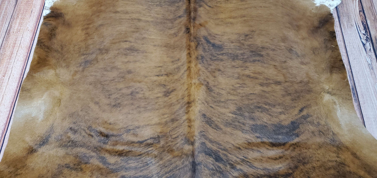 dark brown cowhide rug