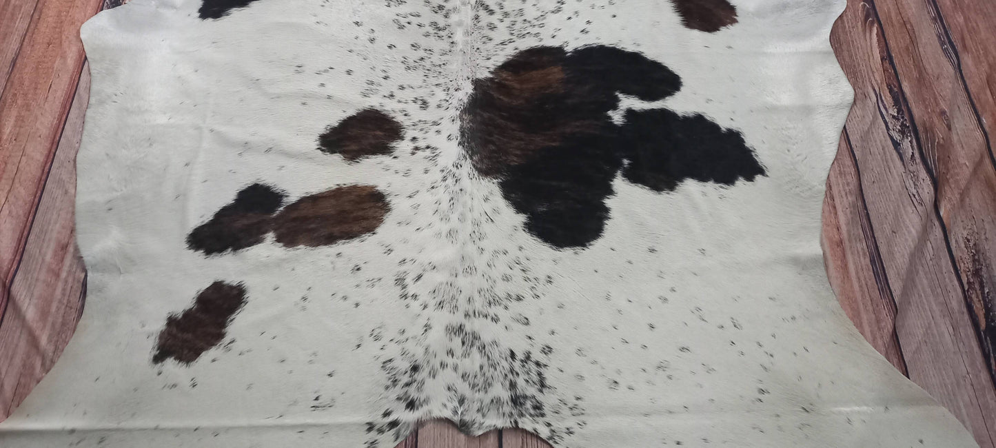 A leather and sheepskin rug with a cowhide rug can look amazing, we have hundreds of shades in stock plus free shipping all over the USA.