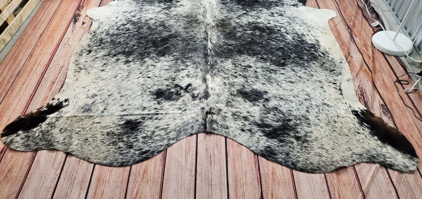 This beautiful oriental cowhide rug is very attractive and definitely even more so in person illustrated with lots of unique details and colors.