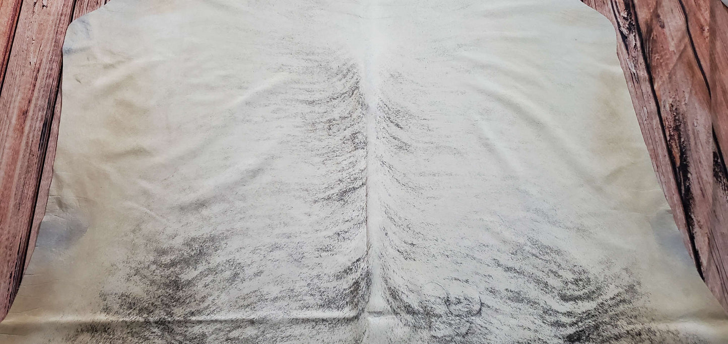 You can enhance the decor of your living room by adding a cowhide rug to your decor, it will add color and modern touch to you space.