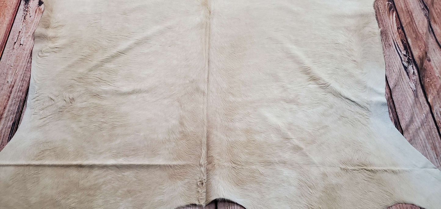 This cream beige cowhide rug lighter shade is excellent for any room, and it fits into your main spaces and free fast shipping all over the USA.