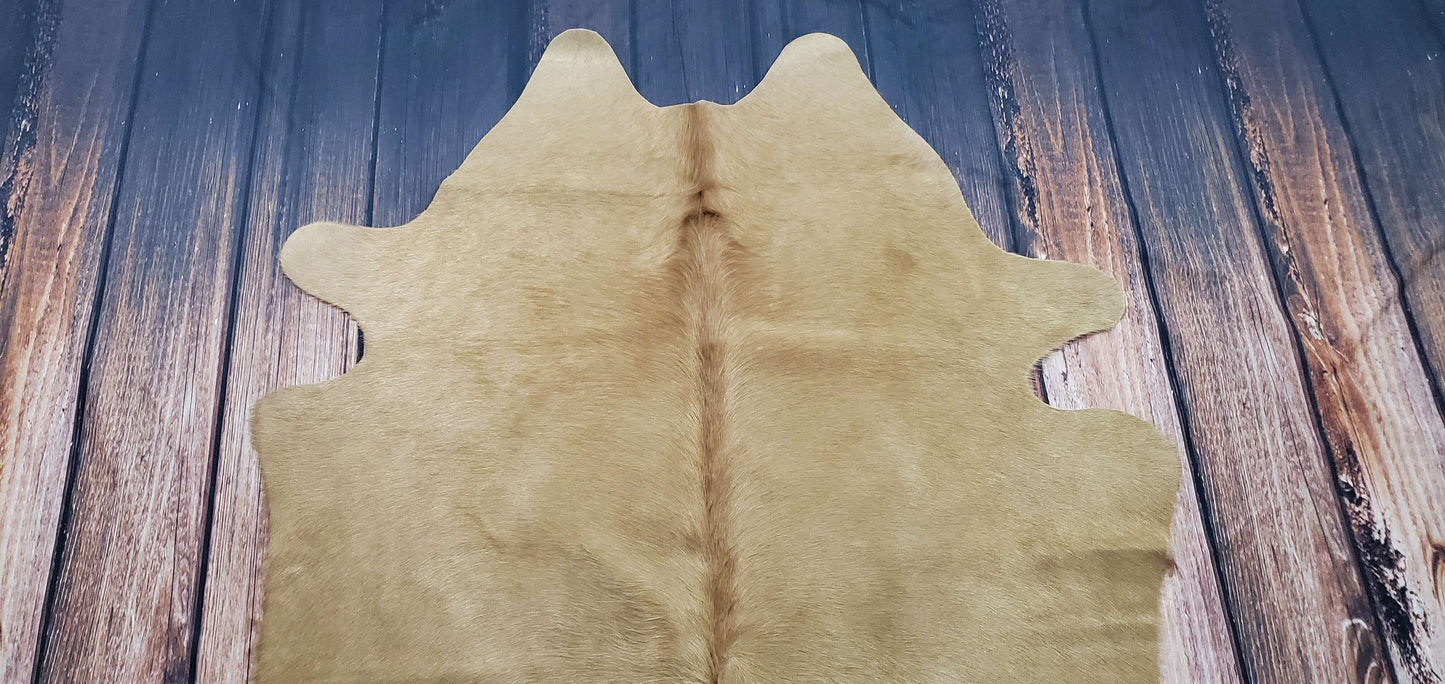 Small cow skin rugs are a great way to start experimenting with this trend. Cowhides are perfect for layering over other rugs or placing in front of the fireplace. 
