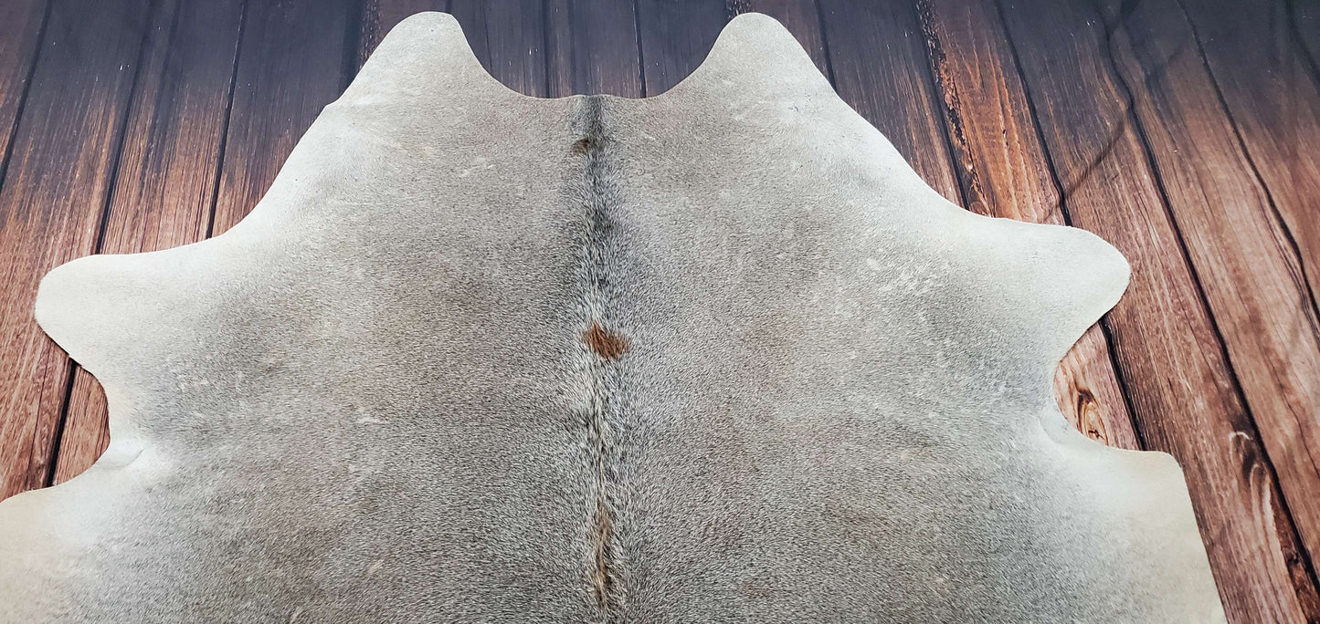 Featuring a grey cowhide rug is a superb choice for busy rooms, from numerous eras and distinct styles. Its genuine, soft, and durable texture is a real asset.