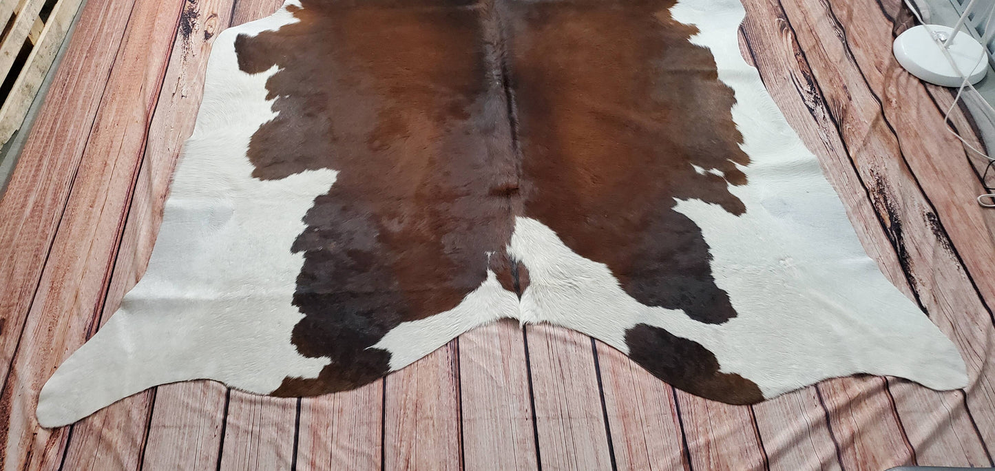 This natural cowhide rug has a softer and more delicate appearance compared to other types of leather rugs, which makes it a great choice for those with children and pets. 