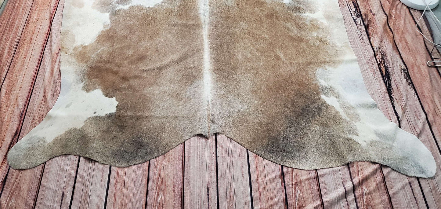 This cowhide rug , which appears beautiful in any room, looks great as an entryway due to its amazingly soft nature; some children also love climbing on it or wrapped over any furniture. 