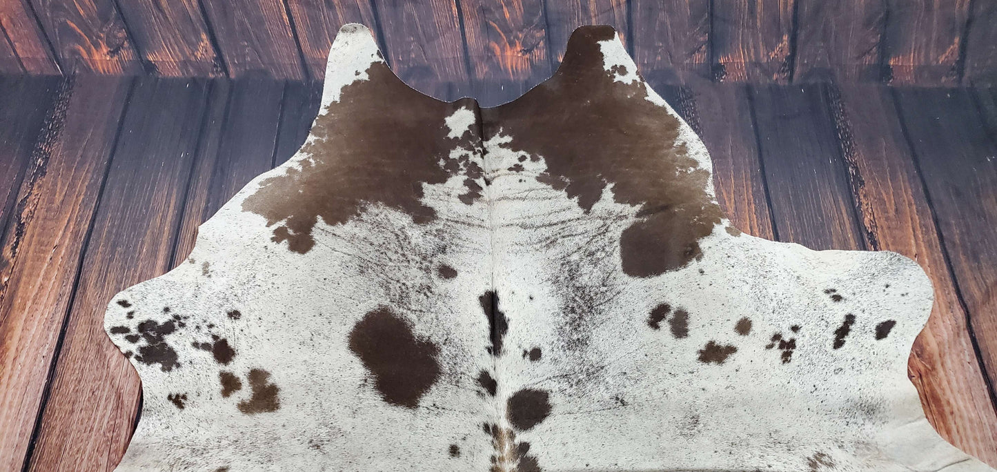 Cowhide rugs are available in many sizes and shapes including round, rectangular, oval, and square