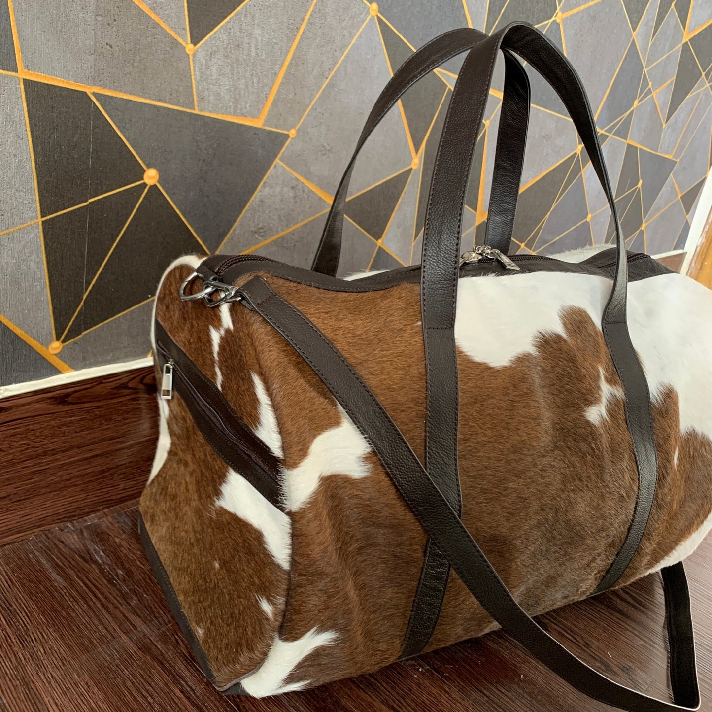 Durable cowhide duffle bag for your on-the-go lifestyle. Ready to go.
