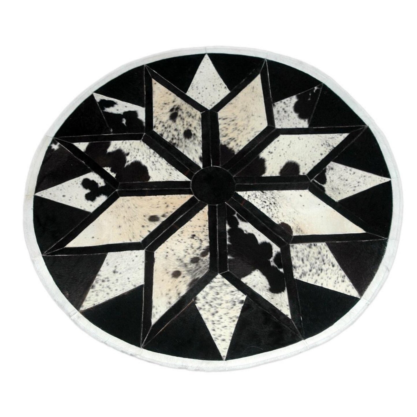 This cowhide patchwork rug is perfect for any interior designer project, entryway, or under a farmhouse table.