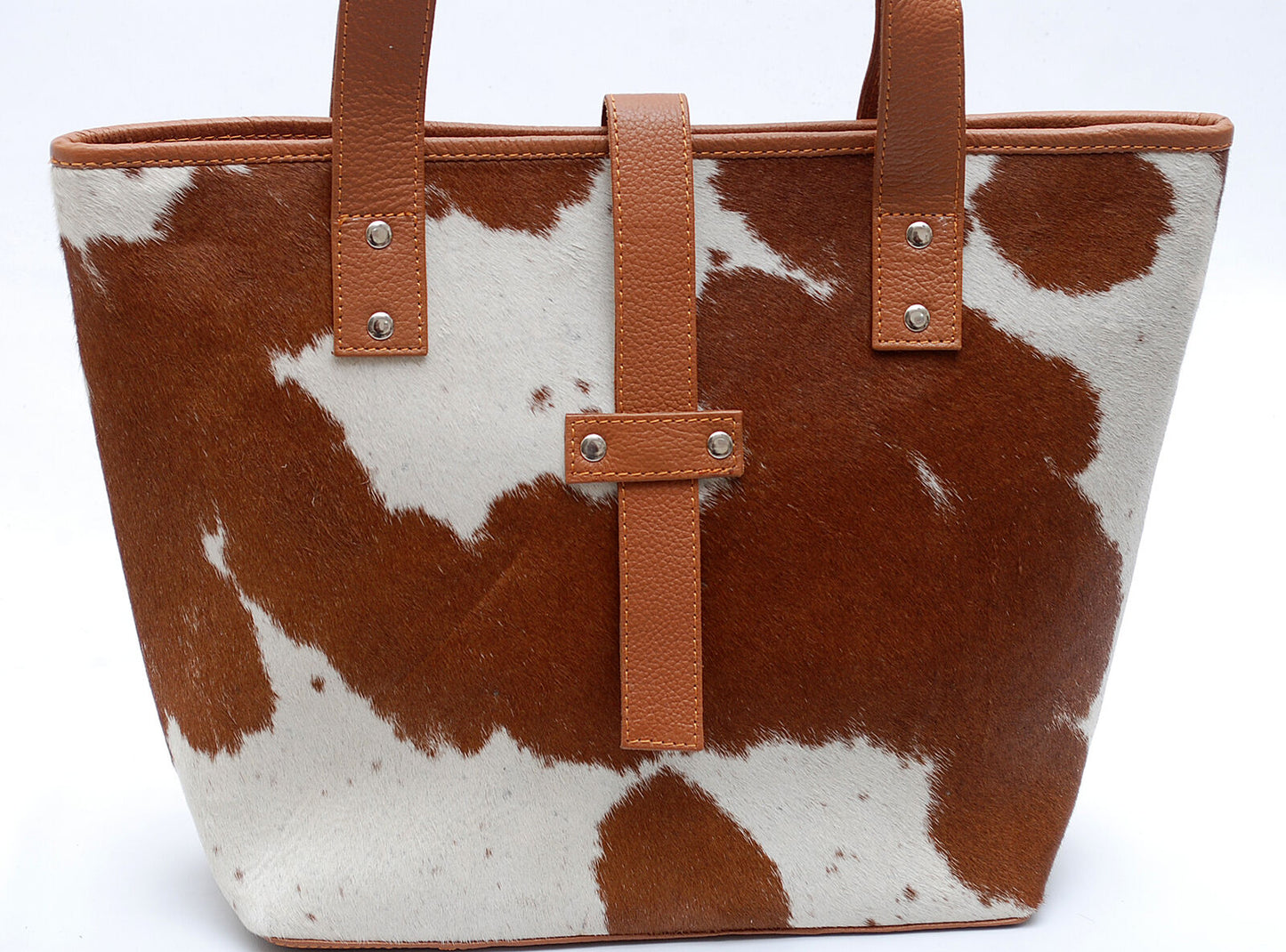 A good quality cowhide bucket bag will last you for years. If you take care of it, it will only look better with age. This makes it a wise investment that will never go out of style.