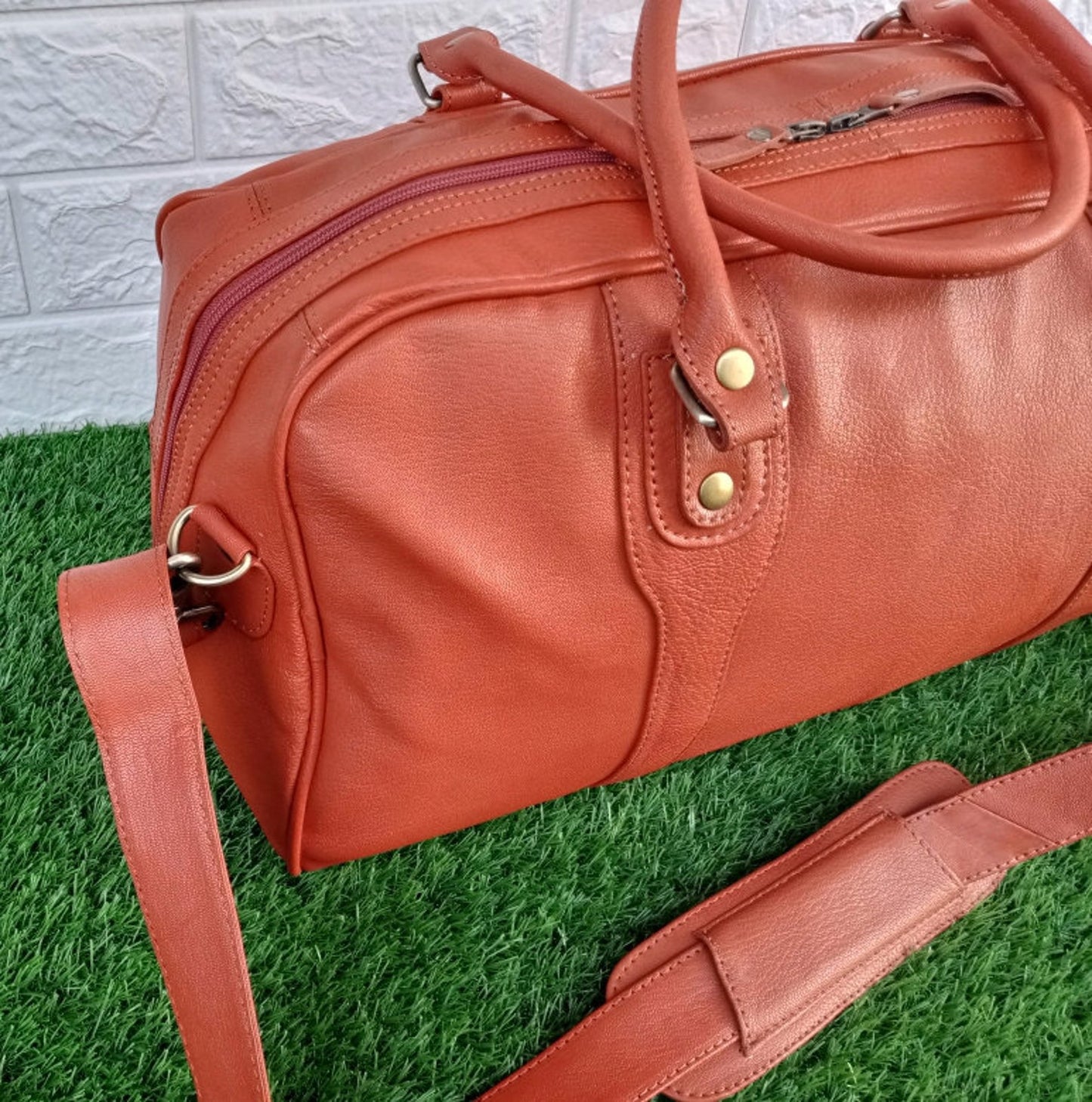 Pumpkin Orange Leather Weekender Bag