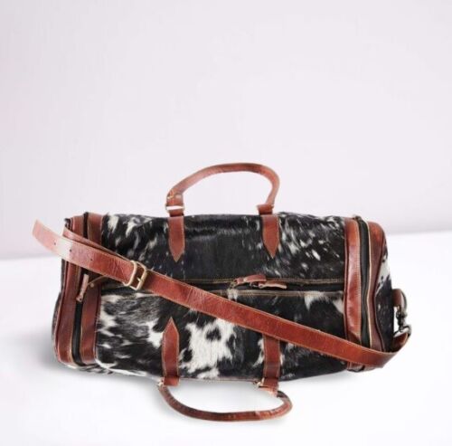 This cowhide luggage bag is the perfect way to travel in style! With its timeless design and luxurious quality, you can be sure that this one-of-a-kind bag will make a statement wherever you go.