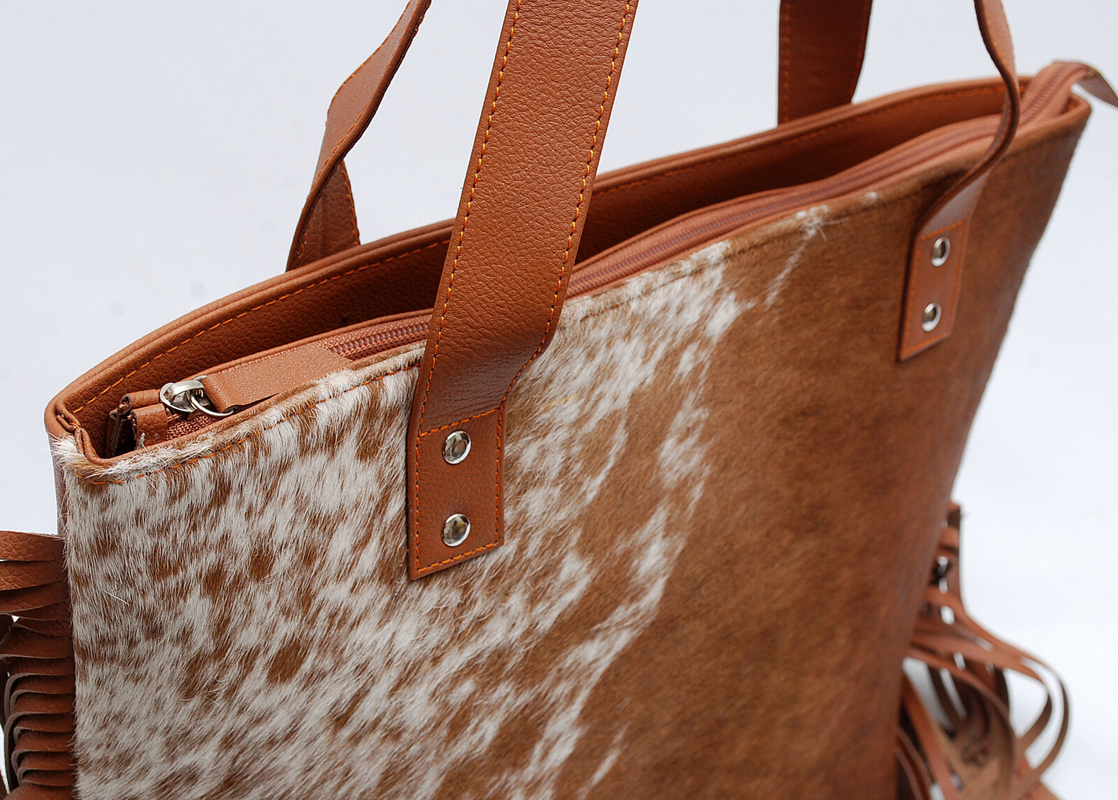These cowhide ladies bags are one of its kind, custom made to order, we will select a gorgeous cowhide rug and only premium leather will be used.