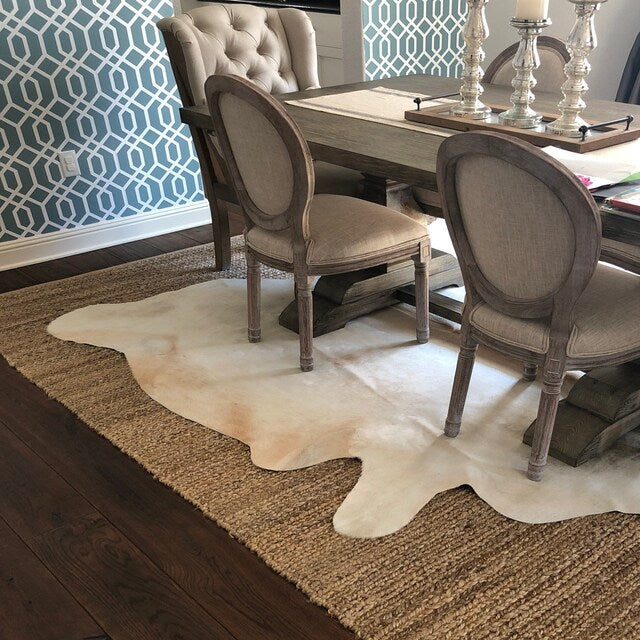 Natural cowhide rugs are a popular choice for home decor due to their unique and rustic look.