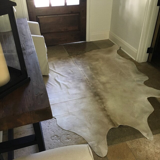 The unique texture and pattern of each individual cowhide adds a touch of natural beauty to any decor scheme. Whether you’re looking for a statement piece or simply an accent to your current space, our cowhide rugs are sure to impress. Plus, with free shipping throughout the USA, it’s never been easier to add a touch of luxury to your home.